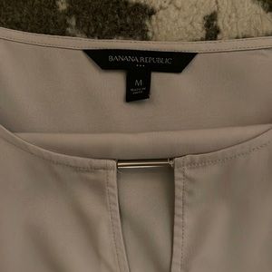 Barley worn tinyyy black mark you can barley see